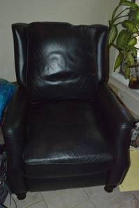 lot 8 image: Navy Blue Leather Reclining Armchair