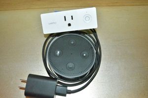 lot 25 image: WEMO mini Smart Plug and Amazon Echo Dot