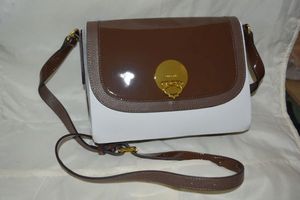 lot 51 image: ORYANY Brown patent leather shoulder purse