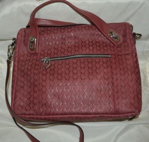 lot 55 image: ORYANY Woven leather purse in Red.
