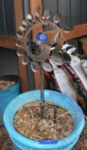 lot 448 image: Flower pot with metal garden stake with blue glass globe