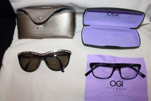 lot 371 image: OGI eyewear with case, BEBE sunglasses (hinge needed re-attached), business card holder, notebook and bendable LED lamp