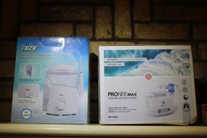 lot 372 image: PRONEB max Aerosol Delivery system and THZY Smart massage oral irrigator  Both unopened still in box