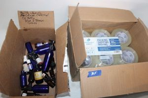 lot 365 image: Clear packing tape unopened with empty essential oil glass bottles (can be boiled and refilled)