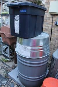 lot 432 image: 60 Gal. Rain collecting barrel with rain gutters