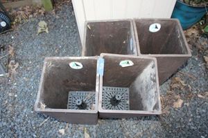 lot 412 image: Set of 4 Tall square flower pots