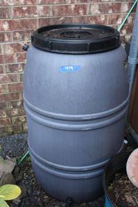 lot 419 image: 60 Gal. Rain collecting barrel.