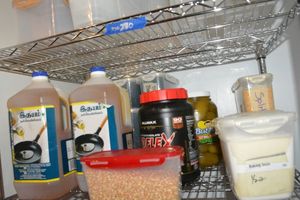 lot 271 image: Food Prep lot Cooking oil, popcorn, Pink Himalayan salt, Black Beans and Baking Soda in LocknLock containers, Whey protein, Dill Pickles