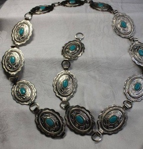 lot 7 image: Western style concho stamped metal belt with faux Turquoise cabochons. 36L