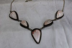 lot 16 image: Sterling Silver Scolecite pear shape gemstone necklace. Hook clasp. Marked 925. 20L Overall length 22L