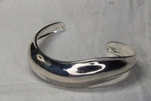 lot 22 image: Sterling Silver bangle bracelet in wave form. Marked RLM Studio 925.
