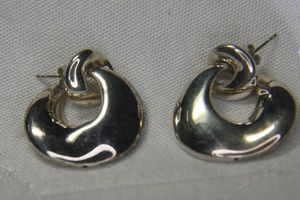 lot 42 image: Sterling modernist hollow form post earrings. Marked 925 Thailand. 1.5L
