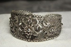 lot 44 image: Sterling Silver Telkari Silesian wire work cuff bracelet with foliage, scrollwork and bead design. Marked 925 Turkey.