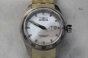 lot 47 image: Invicta watch with Mother of Pearl face. Model 5029. Swiss made.