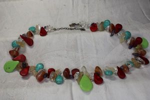 lot 50 image: Sterling Silver and multi gemstone necklace. Includes Amethyst, Howlite, Coral and more. Marked 925. 16L with 3 extender.