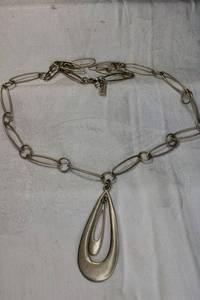 lot 51 image: Signed Liz & Co brass finish necklace with nested pendant. Has Liz & Co hang tag. 24L. Overall 28L