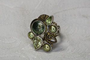lot 52 image: Signed (Margaret Thurman, QVC) Sterling Silver and bronze Echo The Dreamer Verbena flower form wing with Peridot, Limon Quartz and multi-color Pearls Sz 7.