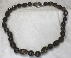 lot 59 image: Sterling Silver signed J & T faceted brown Smoky Quartz necklace with toggle clasp. Marked J & T 925 14L