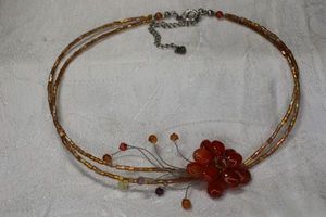 lot 60 image: Carnelian flower and bead choker necklace with spray. 14L with 2 extender. Consignor indicates Bali origin.