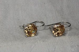 lot 61 image: Sterling Silver Citrine or Golden Quartz ear wire earrings. Marked 925