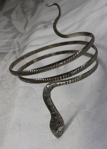 lot 72 image: Artisan crafted Sterling Silver bangle bracelet in coiled snake form. Unmarked.