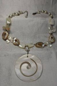 lot 76 image: Sterling Silver Mother of Pearl spiral disc pendant on MOP and freshwater button pearl necklace. Marked 925. 16L with 2 extender. Lobster clasp.
