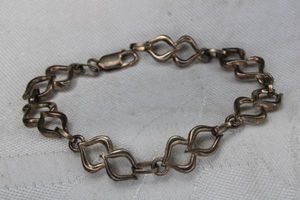 lot 77 image: Sterling Silver fancy link bracelet. Marked 925 on lobster clasp. 8L