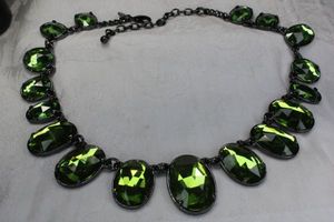 lot 85 image: Signed Joan Rivers Classic Collection 20th year anniversary green festoon necklace in burnished finish. Has hang tag. 16L with 3 extender.