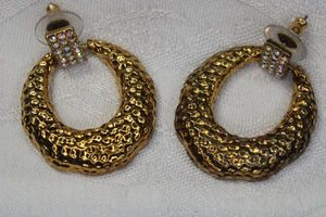 lot 97 image: Signed Joan Rivers hammered and pave crystal post earrings. Marked Joan Rivers.1.75L