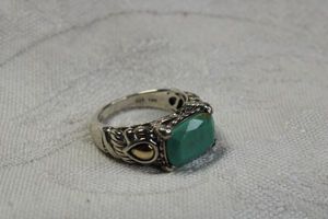lot 106 image: Signed JAI (John Hardy) Sterling Silver and 14K accent Turquoise ring. Marked JAI 925 14K inside. Size 7