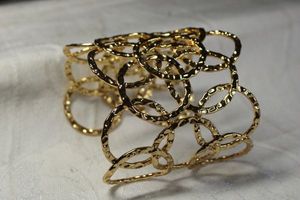 lot 109 image: Gold plated modernist cuff bracelet. 2.5W