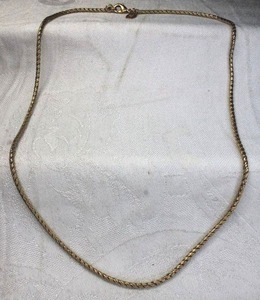 lot 170 image: Signed Kenneth Jay Lane twisted rope braid necklace in gold finish. Has KJL hang tag. 20L with lobster clasp.