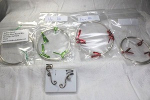 lot 187 image: Sterling Silver round wire 20 Gauge (4 packages). Includes a pair of artisan crafted sterling silver wire ear cuffs.