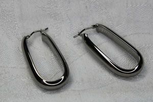 lot 140 image: Signed Milor Italian high polish bronze elliptical post earrings in gunmetal finish. Marked Milor Italy Bronze. 1.5L