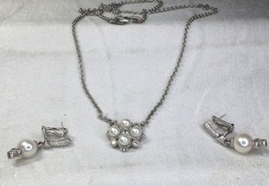 lot 160 image: Signed Judith Ripka Sterling Silver, Pearl and CZ necklace with heart shaped locket and matching post pearl dangle earrings. Both marked 925. Earrings also marked Judith Ripka.18L