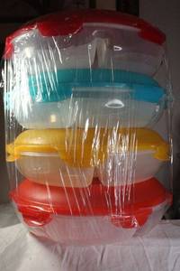 lot 257 image: Round segmented organization storage trays with locking lids. Set of 4