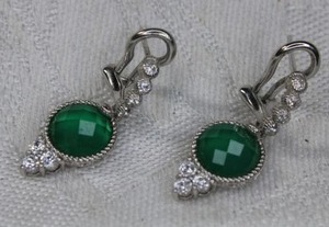 lot 213 image: Signed Judith Ripka faceted faux Emerald and CZ dangle post earrings. Marked 925 CZ Judith Ripka on CZ. 1.25L