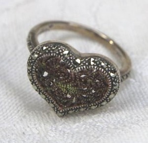 lot 215 image: Signed MARC Sterling Silver figural marcasite heart ring (Marked MARC 925). Size 8