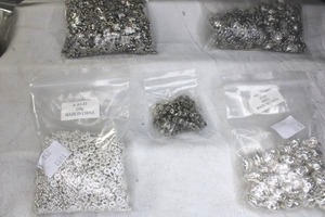 lot 225 image: Assorted jewelry findings and fittings, spacers, beads in silver finish.