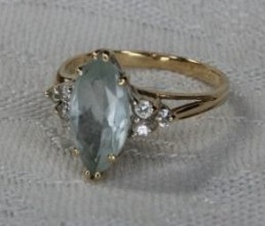 lot 2 image: 14K yellow gold Aquamarine and diamond ring. Diamonds tested. Size 5.5. Marked 14K inside.