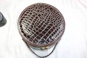 lot 222 image: Nordstrom branded croco-embossed vinyl travel case with double zipper pulls. Marked Nordstrom inside. Includes assorted velveteen pouches, cases and brass ashtray