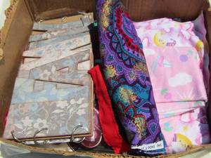 lot 73 image: family signs- adhesive tape- various fabric pieces