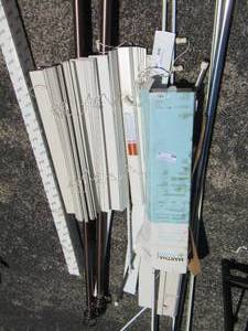 lot 76 image: lot of blinds new and used also curtain rods