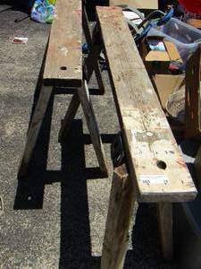 lot 78 image: 2 wooden saw horses- , one needs minor repair on leg