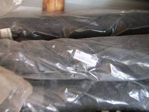 lot 97 image: Black Nissan Versa car rug for truck all new qty 3