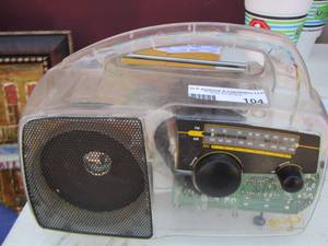 lot 104 image: Freeplay AMFM radio self powered