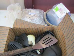 lot 107 image: kitchen items, kitchen scale, measuring cups, plastic Tupperware, utensils