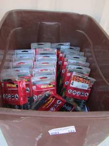 lot 123 image: tote full of wrap packs , new electrical cord organizers qty 25