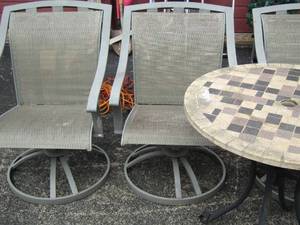 lot 139 image: 3 outdoor patio chairs   2 need the seats redone, oval patio table has spot for umbrella 29x30 diameter