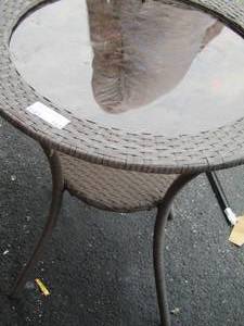 lot 143 image: Wicker style patio table oval size 29x25  diameter